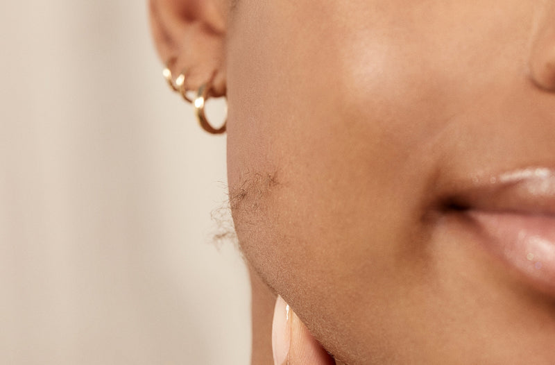 Does Minoxidil Cause Facial Hair Growth? (And How Sonic Dermaplaning Can Help!)