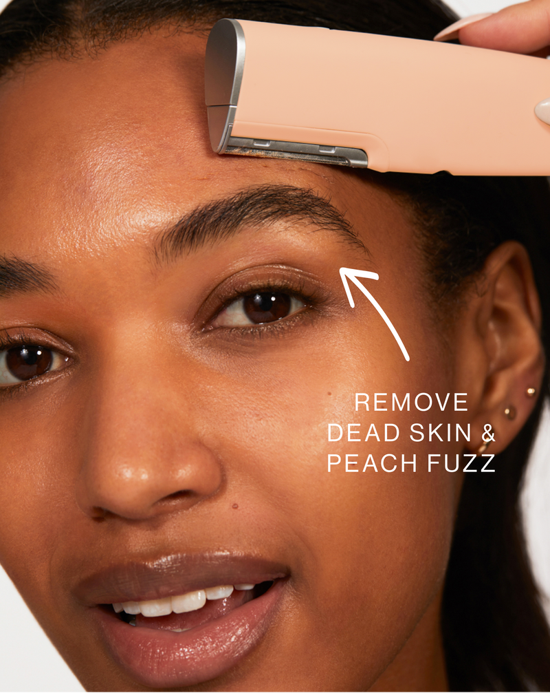 Peach Fuzz | Model using LUXE+ dermaplaning device in Peach Fuzz