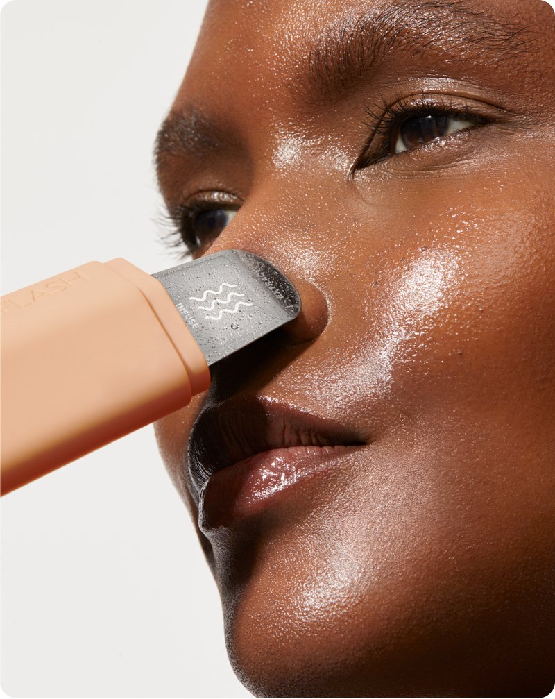 Peach Fuzz | model using DERMAPORE+ pore extractor in Peach Fuzz on her face