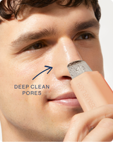DERMAPORE+ - Peach Fuzz | model using DERMAPORE+ blackhead scraper in Peach Fuzz on his face 