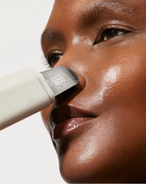 Stone | Image of model using DERMAPORE+ to extract pores on her nose