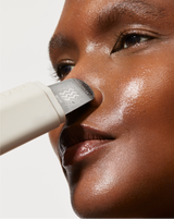 COMPLETE SONIC SKINCARE SET - Stone | model using DERMAPORE+ from the Complete Sonic Skincare Set in Stone