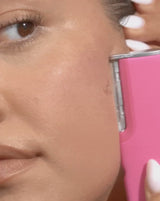 COMPLETE SONIC SKINCARE SET - Stone | model flashing peach fuzz off her cheek